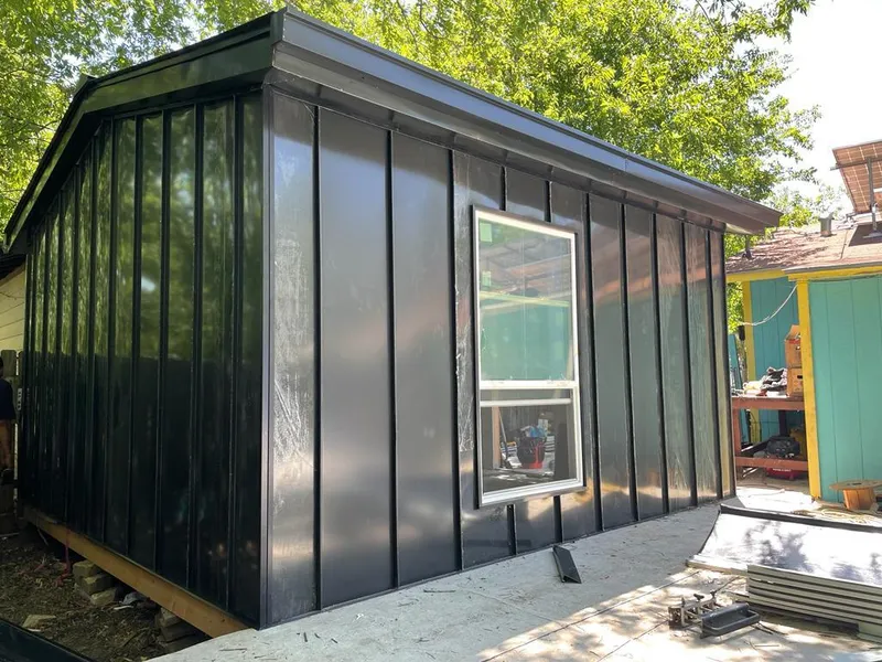 Black standing seam metal wall panels for Metal Roof Installation in Falmouth